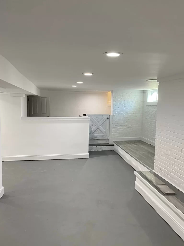 Finished basement family room in Edison NJ by VIC Construction